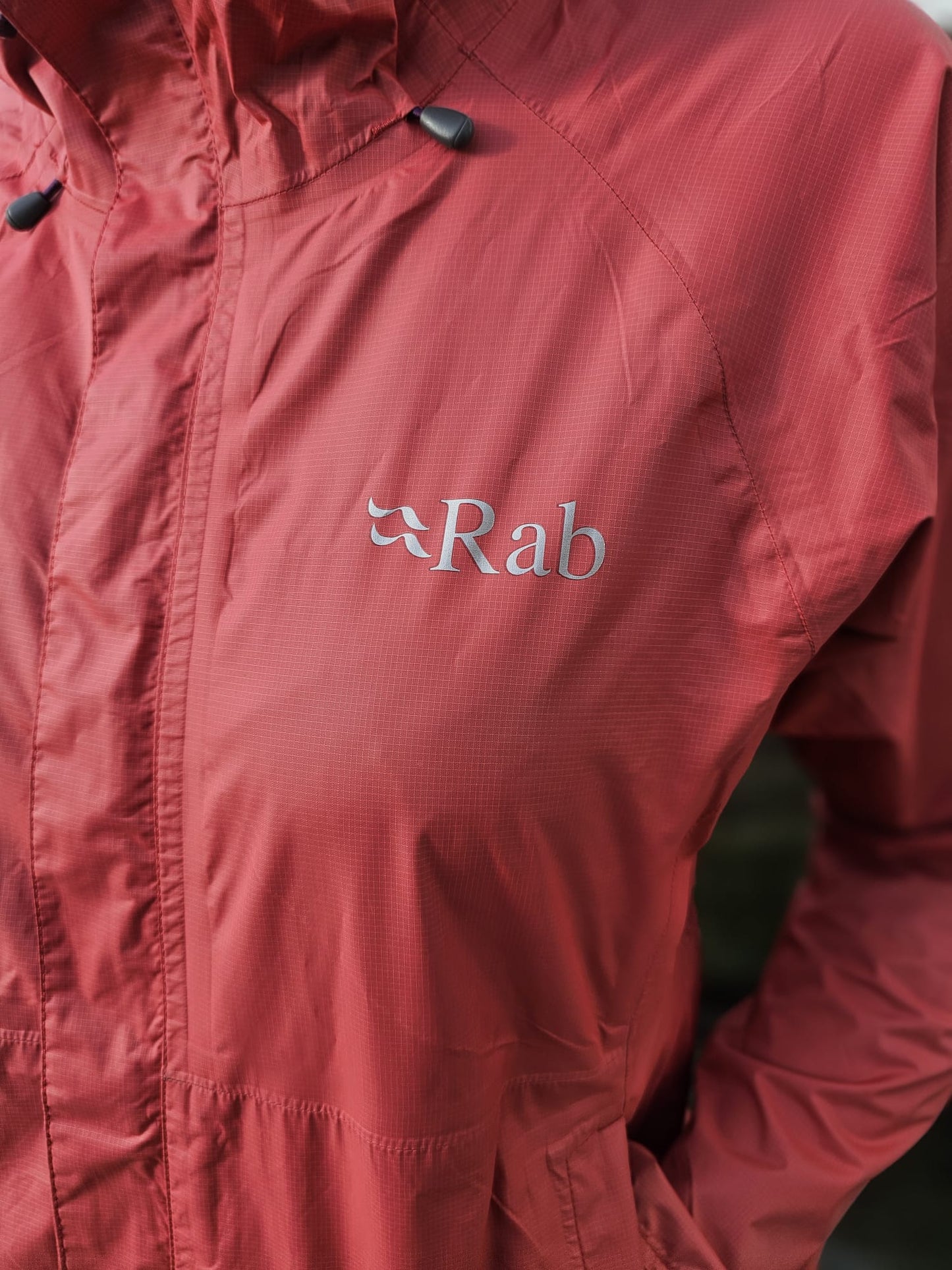 Womens Rab full zip hooded waterproof rain coat/jacket - UK 8 - Pinky/Red
