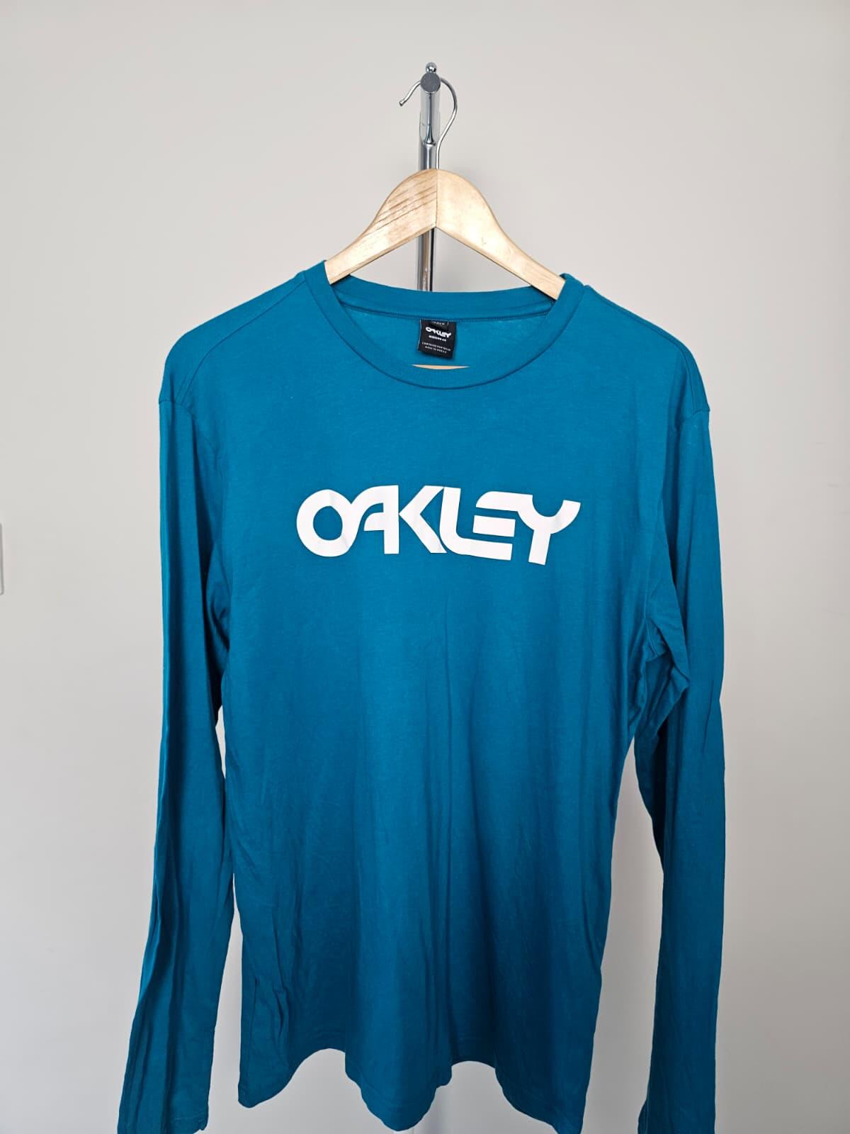 Oakley Men's Long Sleeve Mark 2 Big Spell out Print T-Shirt  M/Medium Teal Blue