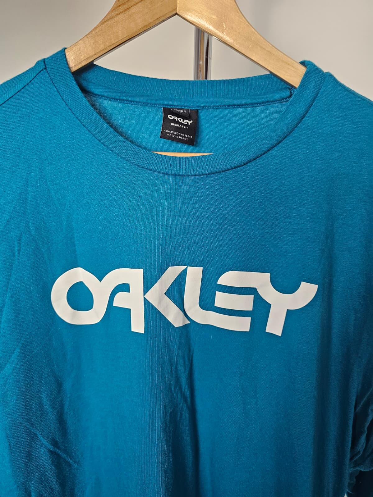 Oakley Men's Long Sleeve Mark 2 Big Spell out Print T-Shirt  M/Medium Teal Blue